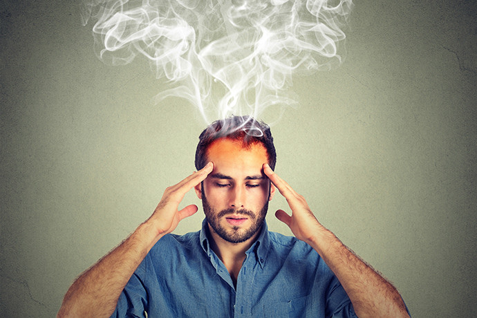 Man experiencing brain fog from mental exhaustion
