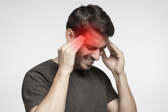 Tension headache symptoms in women