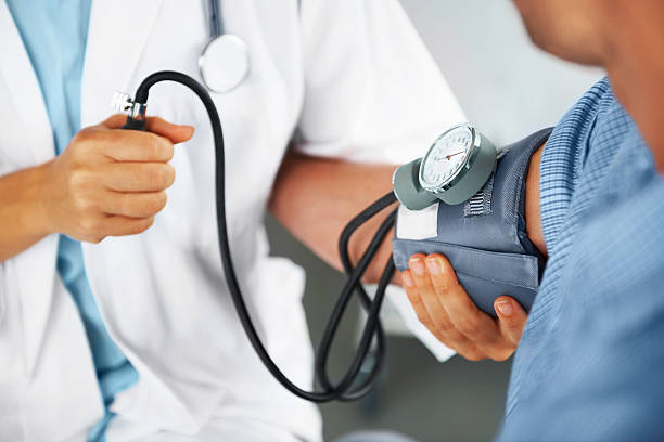 Hypertension infographic showing causes, symptoms, and prevention tips