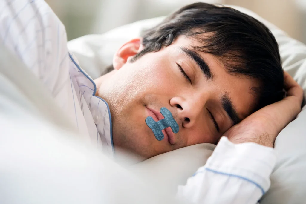 Mouth taping while sleeping shown in an infographic, promoting the health trend and its potential sleep benefits.